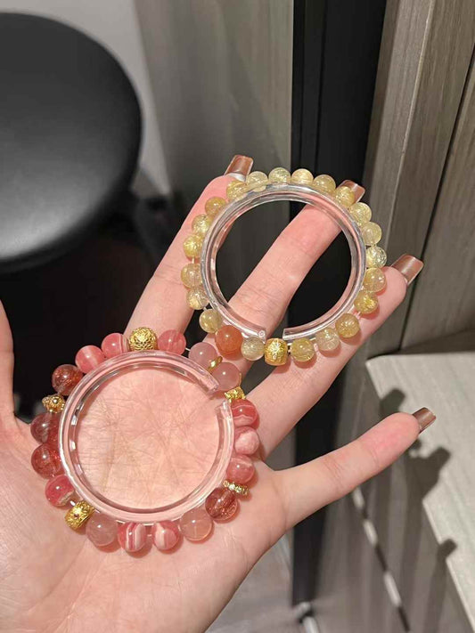 Golden Rutilated Quartz & Rhodochrosite Set: Abundance, Love, and Eternal Bond